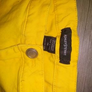 Yellow distressed jeans